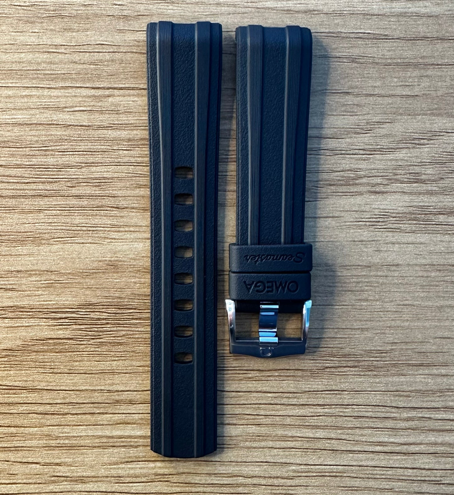 black Omega rubber strap